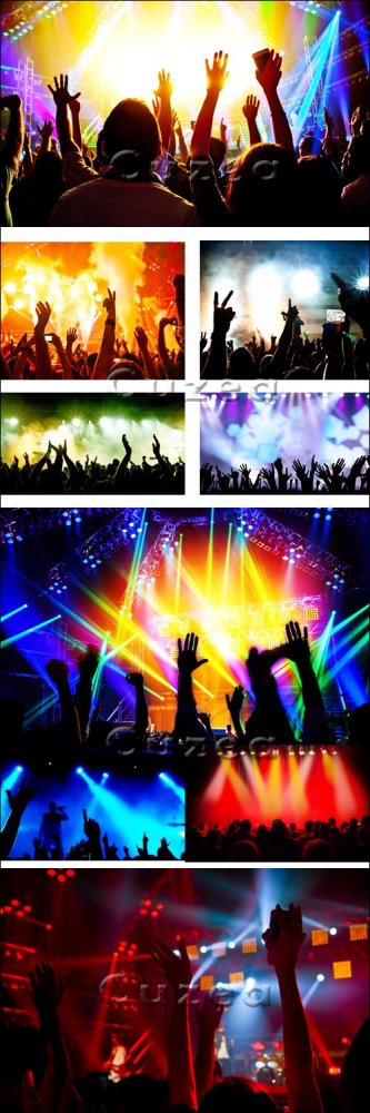 Поднятые вверх руки на концерте/ Applause of the audience at a concert - Stock photo