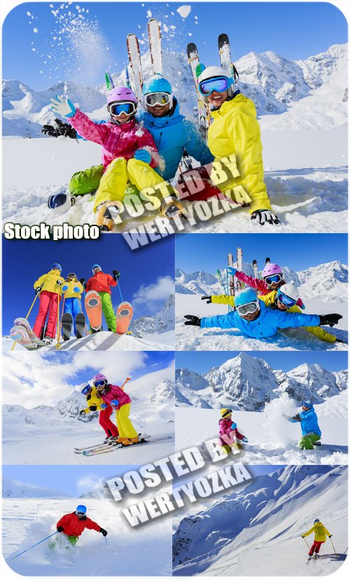 Семейный отдых на горнолыжном курорте / Family fun at ski resort - stock photo