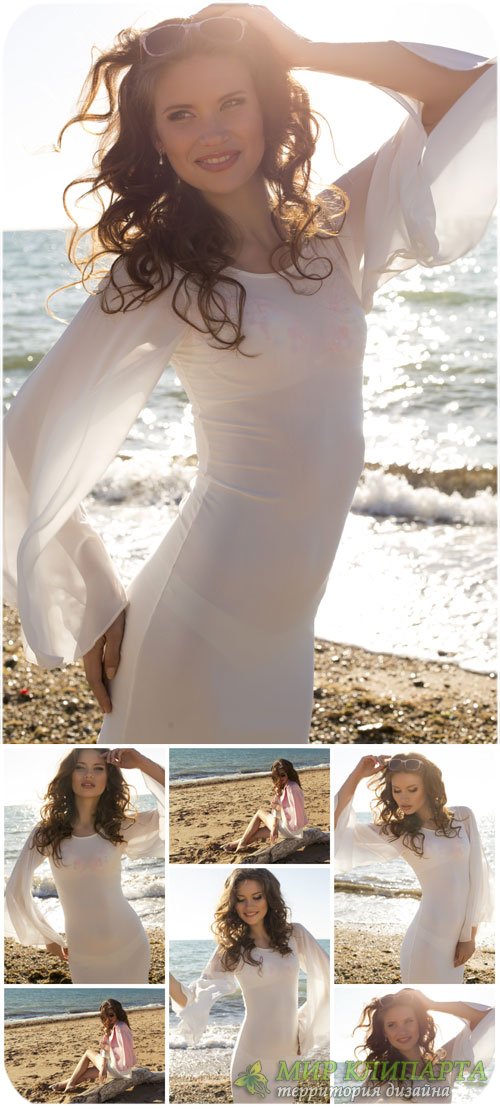 Девушка в белом платье на берегу моря / Girl in white dress on the beach - Stock Photo