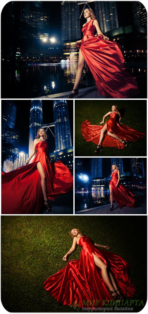Девушка в красном платье на фоне ночного города / Girl in a red dress on a night city - Stock Photo